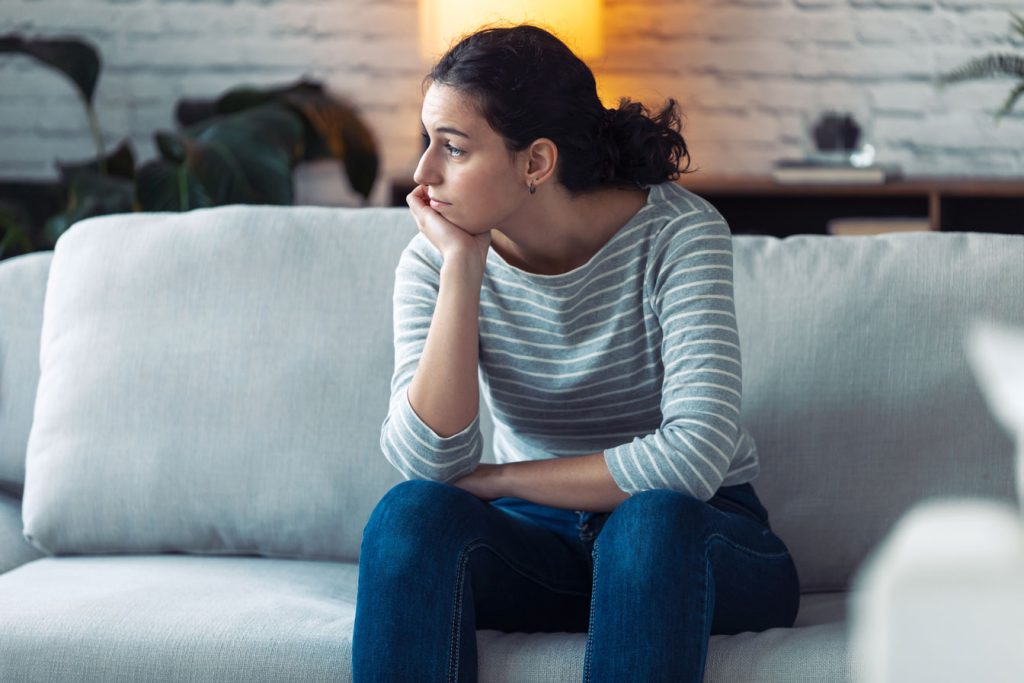 Frustrated individual stuck at home