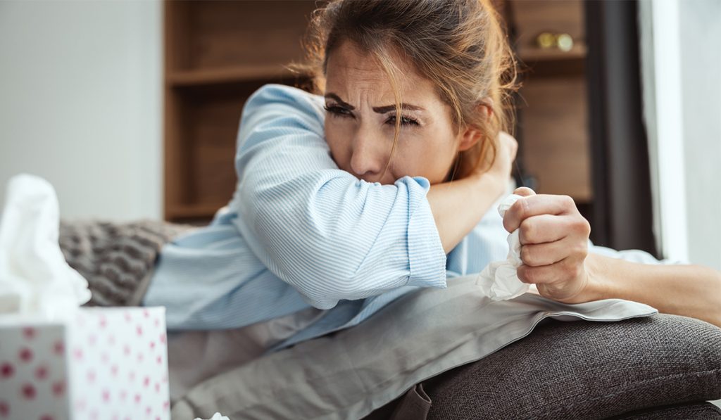 Sick woman on a sofa