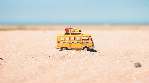 Toy camper van on the beach