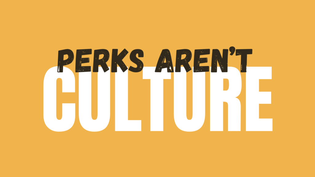 Orange poster with large white block text partially obscured by a distressed black headline reading “PERKS ARENT” across the center. The design emphasizes the bold contrast between white and black typography.